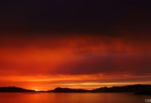 Sonnenuntergang in Hundeidvik mit Blick auf den Storfjord